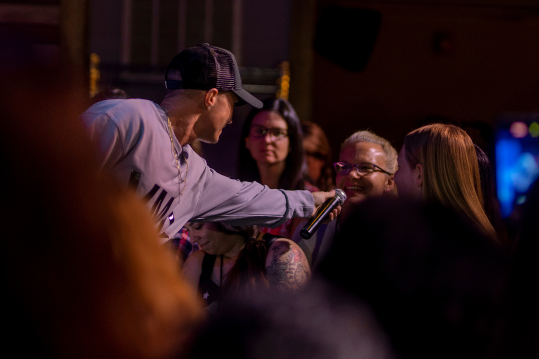 Leon Budrow engaging directly with audience members