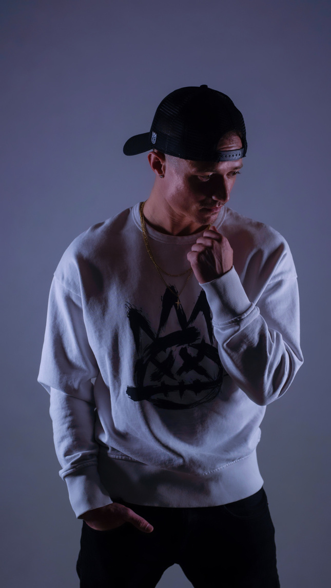 Leon Budrow in a dark editorial portrait